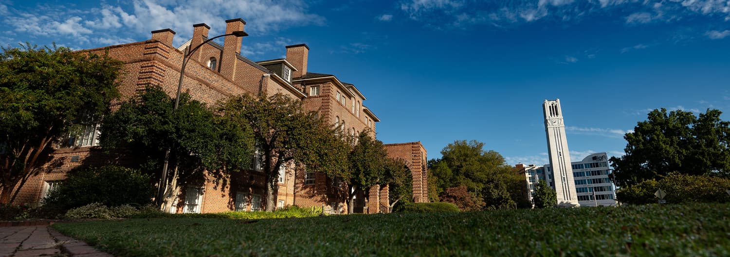 Holladay Hall with the Memorial Belltower in the background.